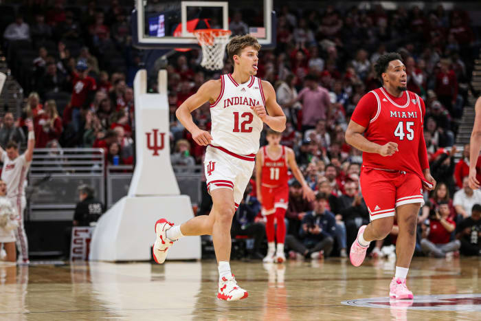 Miller Kopp wags his tongue while running upcourt after hitting a three-pointer on Sunday at Gainbridge Fieldhouse in Indianapolis. (Photo courtesy of IU Athletics)